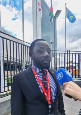 A person in a suit

AI-generated content may be incorrect.